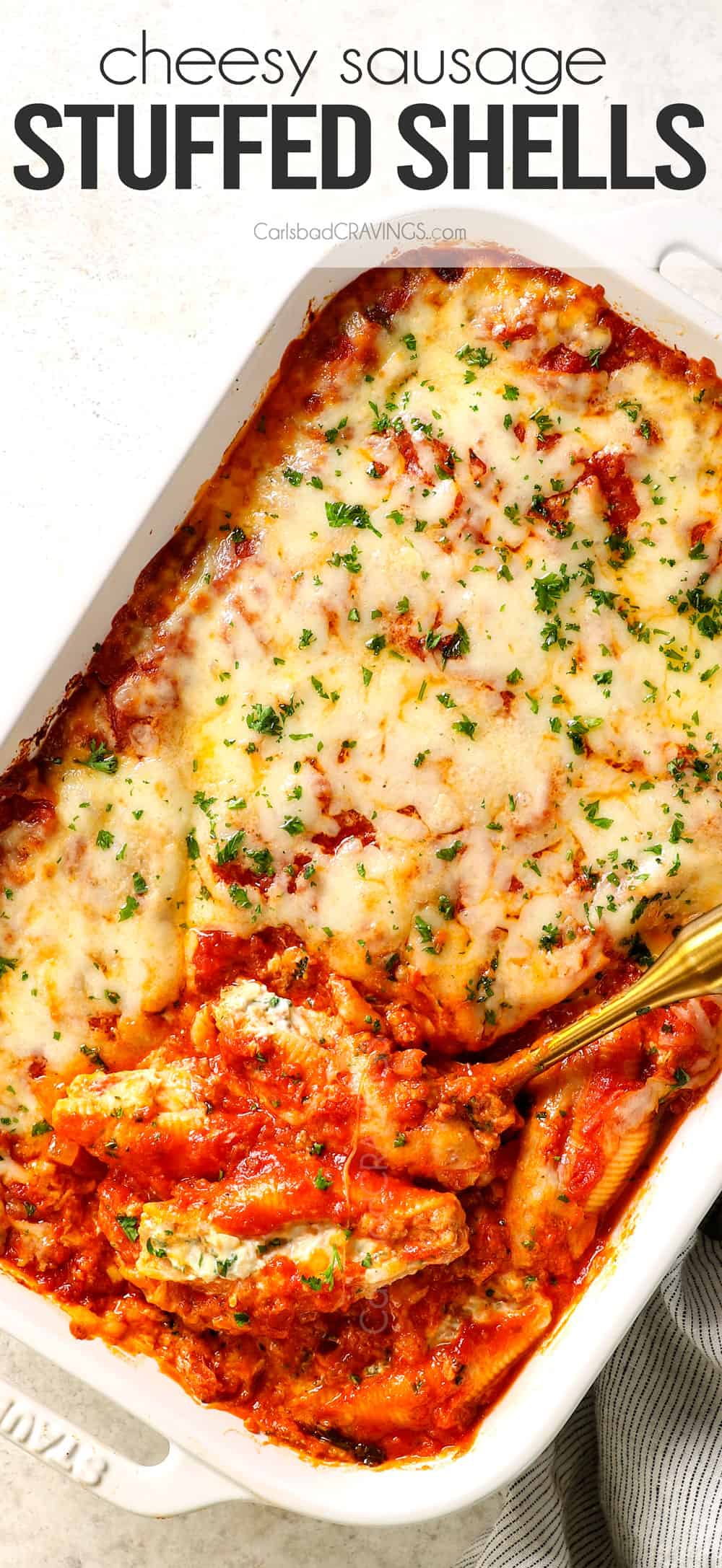 top view of stuffed shells topped with marinara and mozzarella
