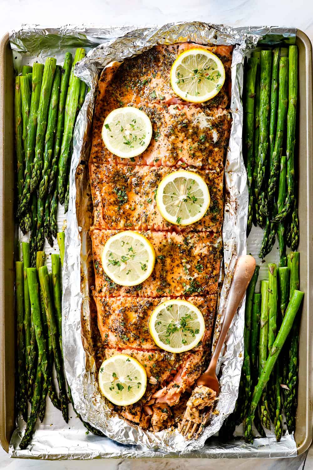 top view of baked lemon pepper salmon recipe with asparagus