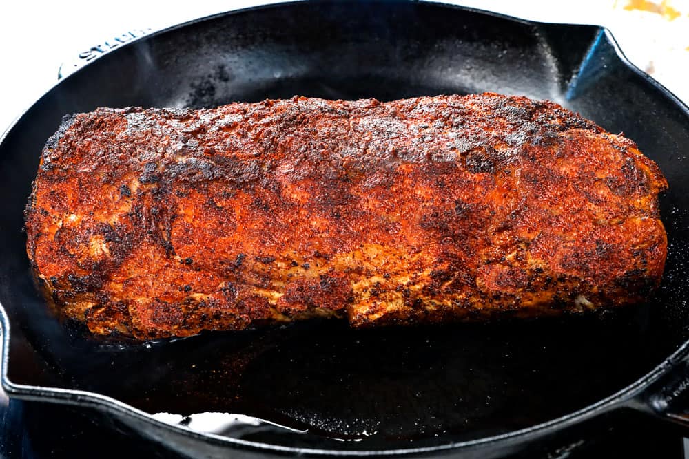 showing how to make pork loin roast by searing pork until golden
