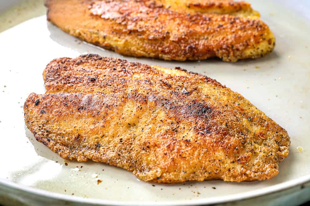 showing how to pan fry tilapia in a skillet until deeply golden