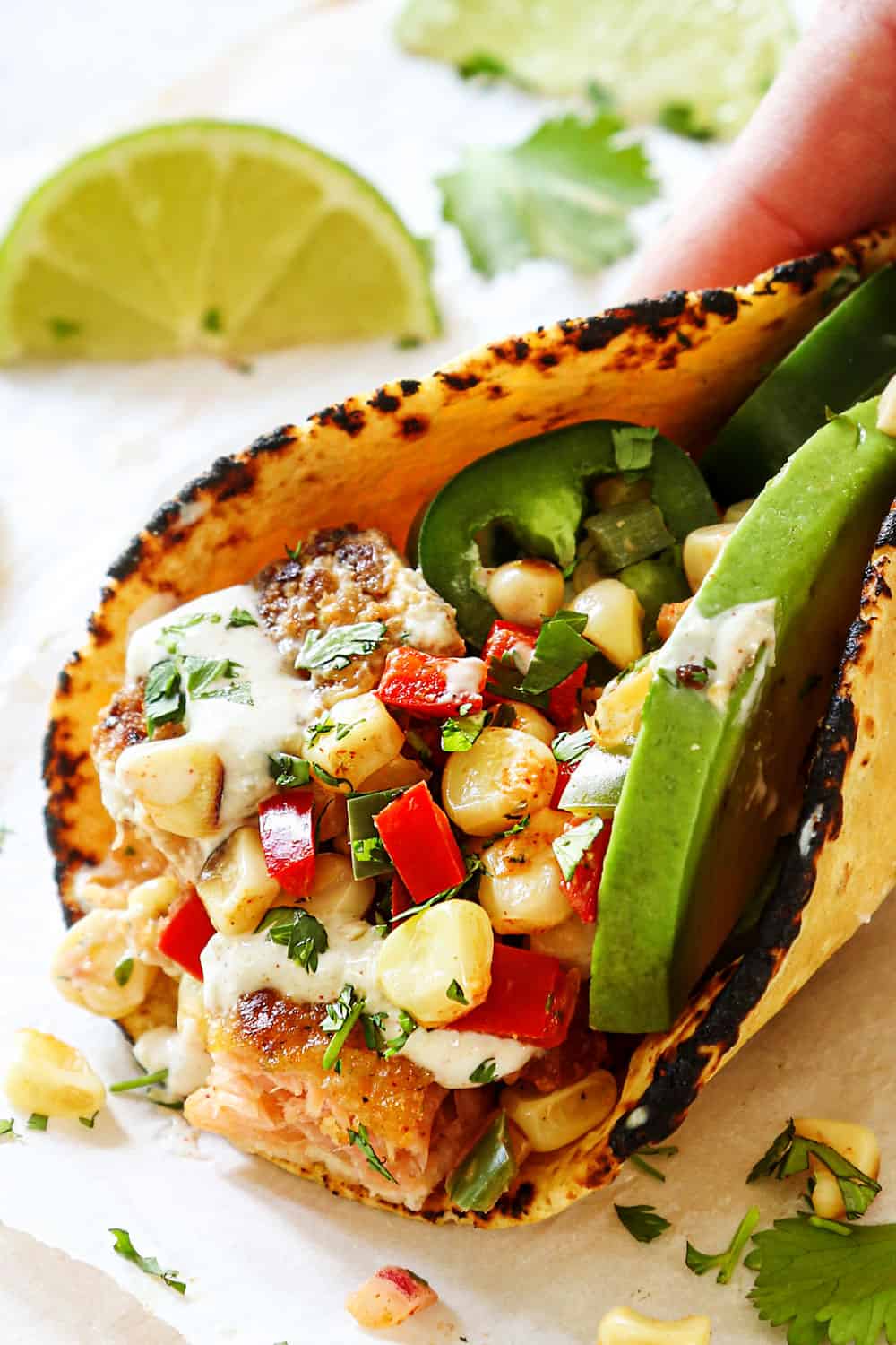 up close of easy salmon fish taco recipe showing how crispy the salmon is