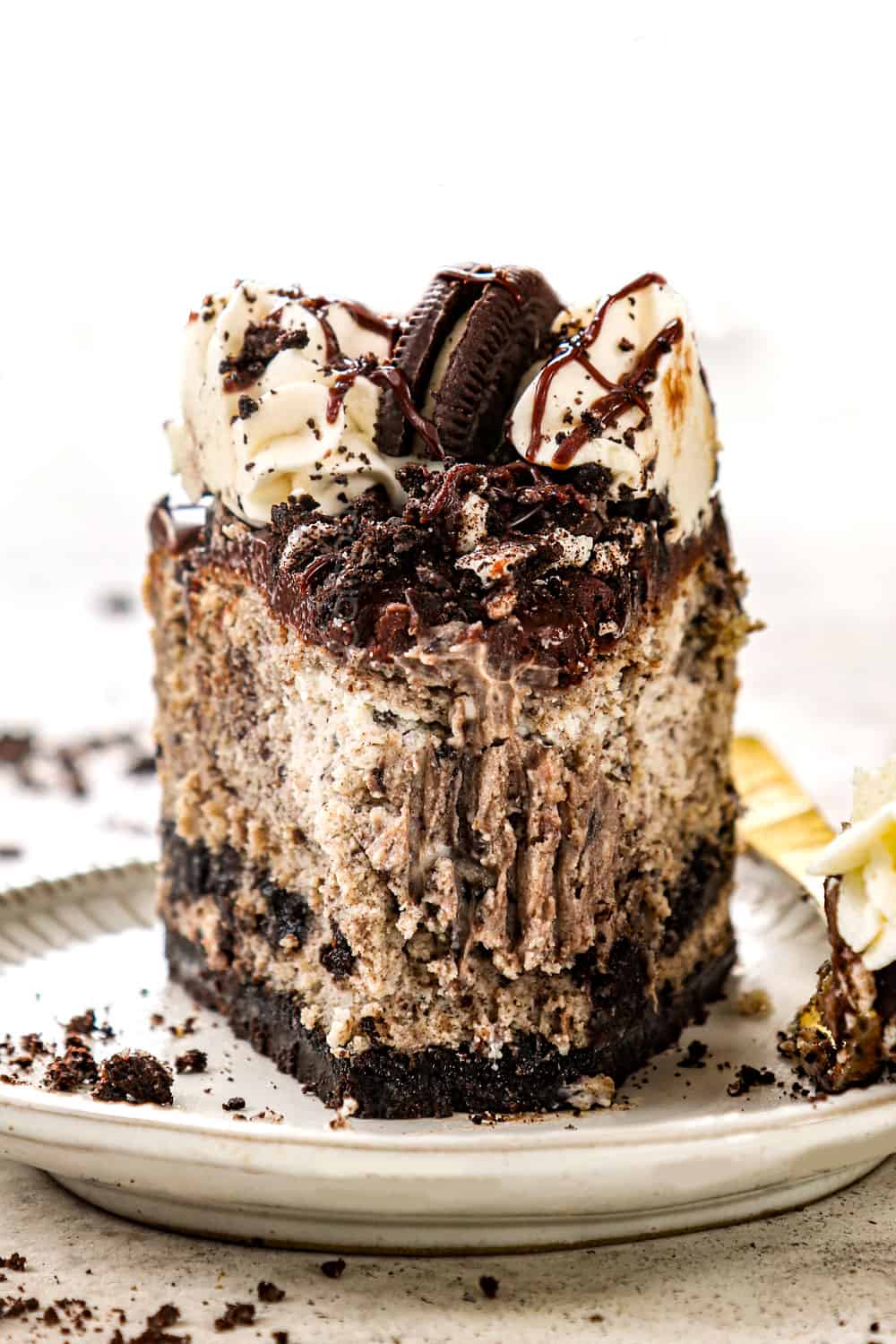 up close of Oreo cheesecake with a bite taken out