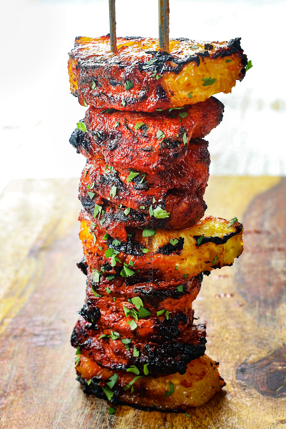 chicken al pastor after it's cooked showing how juicy it is