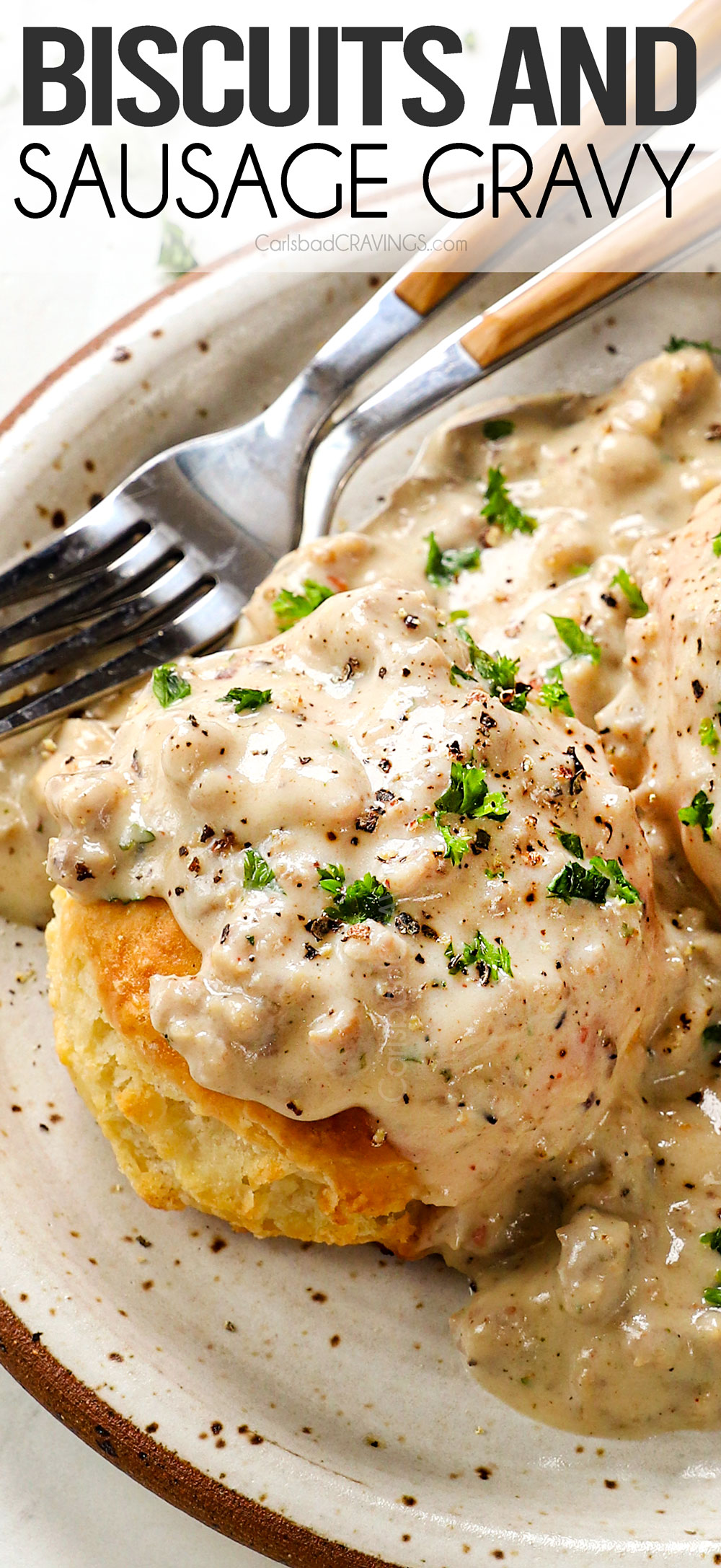 up close of biscuits and gravy recipe served with homemade buttermilk biscuits and sausage gravy on a plate garnished by parsley and freshly cracked pepper
