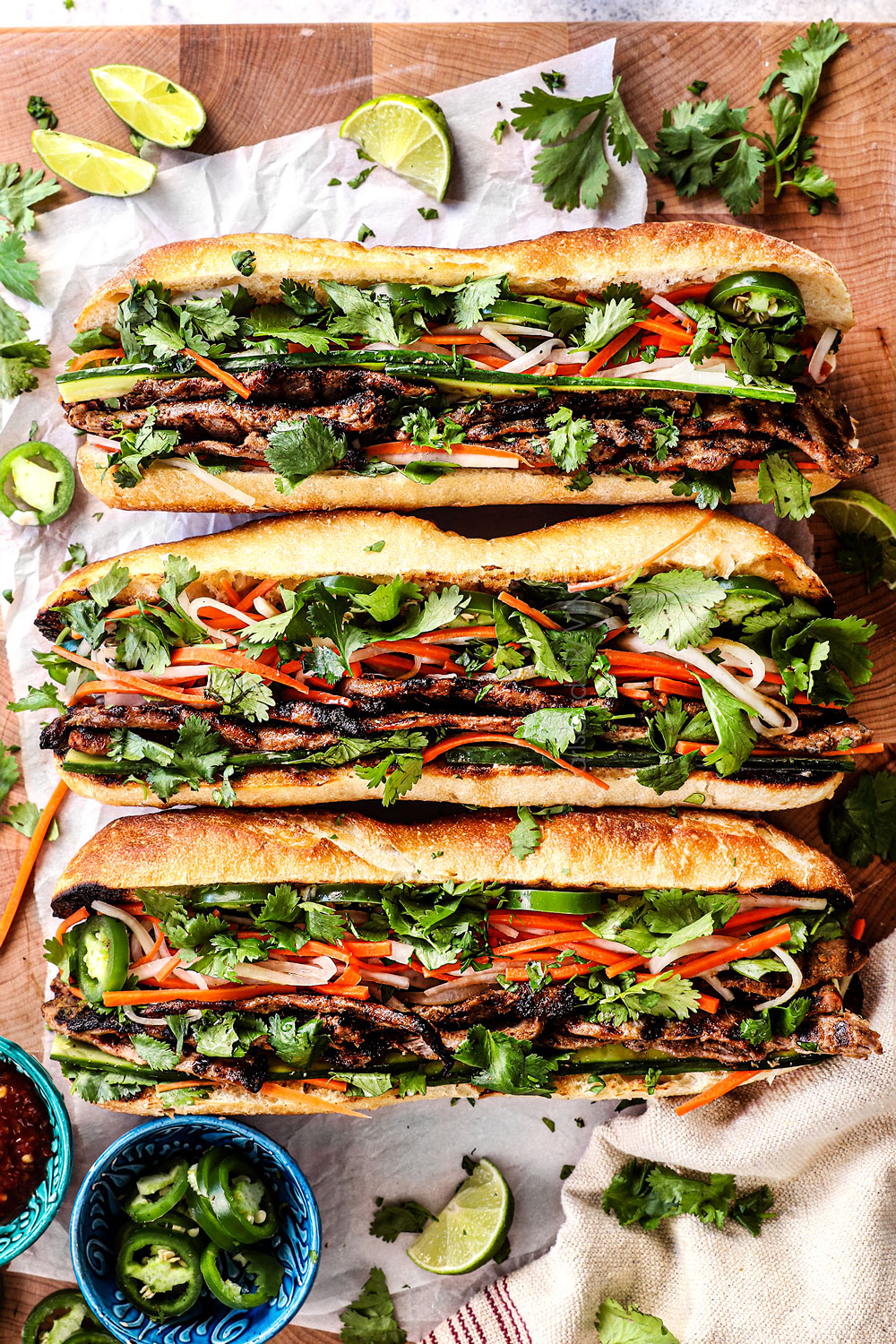 banh mi sandwich recipe lined on a cutting board showing which bread to use for the Vietnamese sandwiches