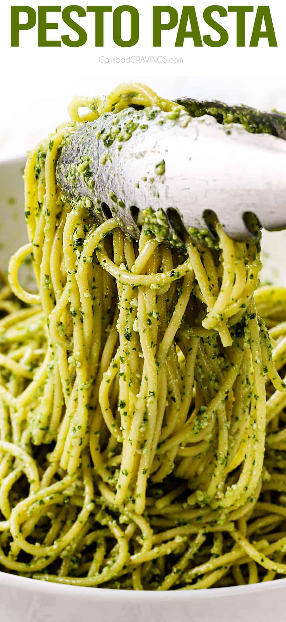 showing how to make pesto pasta recipe by tossing pesto with linguine pasta