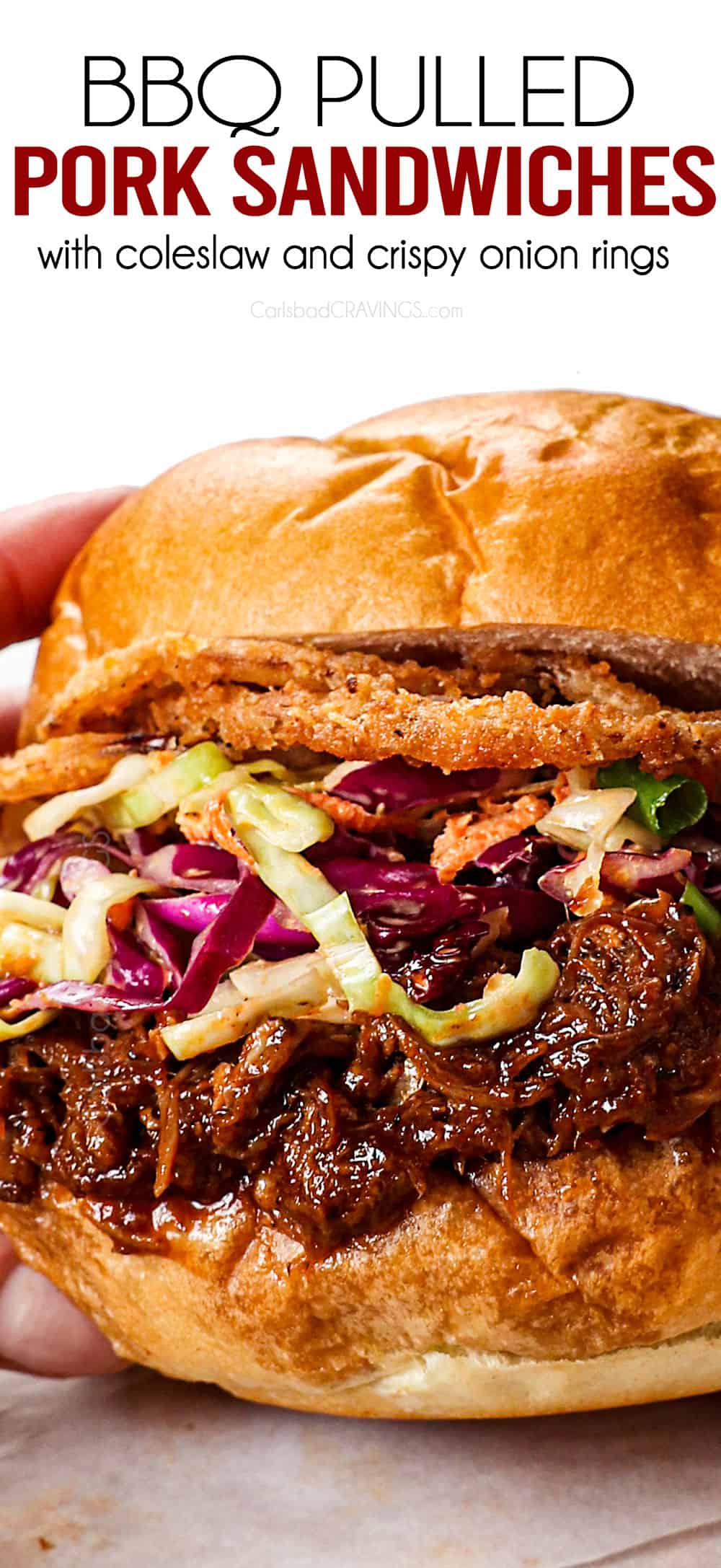up close of pulled pork sandwiches with bbq sauce showing how juicy they are