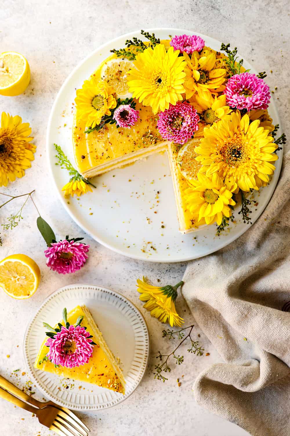 top view of moist lemon cake recipe with a slice removed