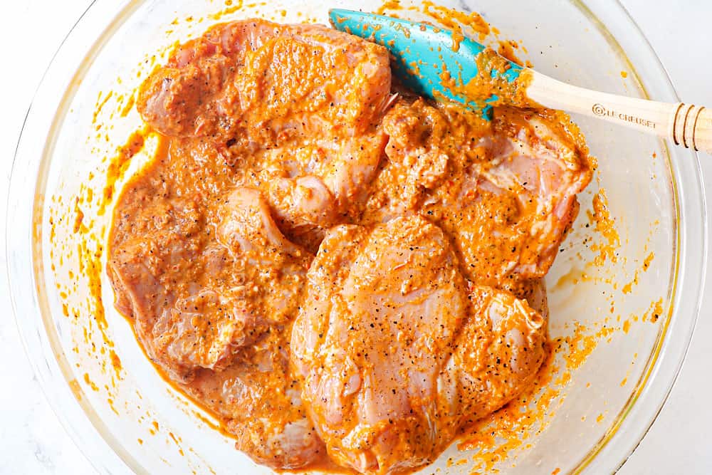 showing how to make peri peri chicken by making peri peri sauce by marinating the chicken in the peri peri sauce