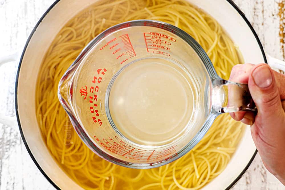 showing how to make lemon pasta (pasta al limone) by cooking spaghetti in water and removing some of the starch water for the sauce