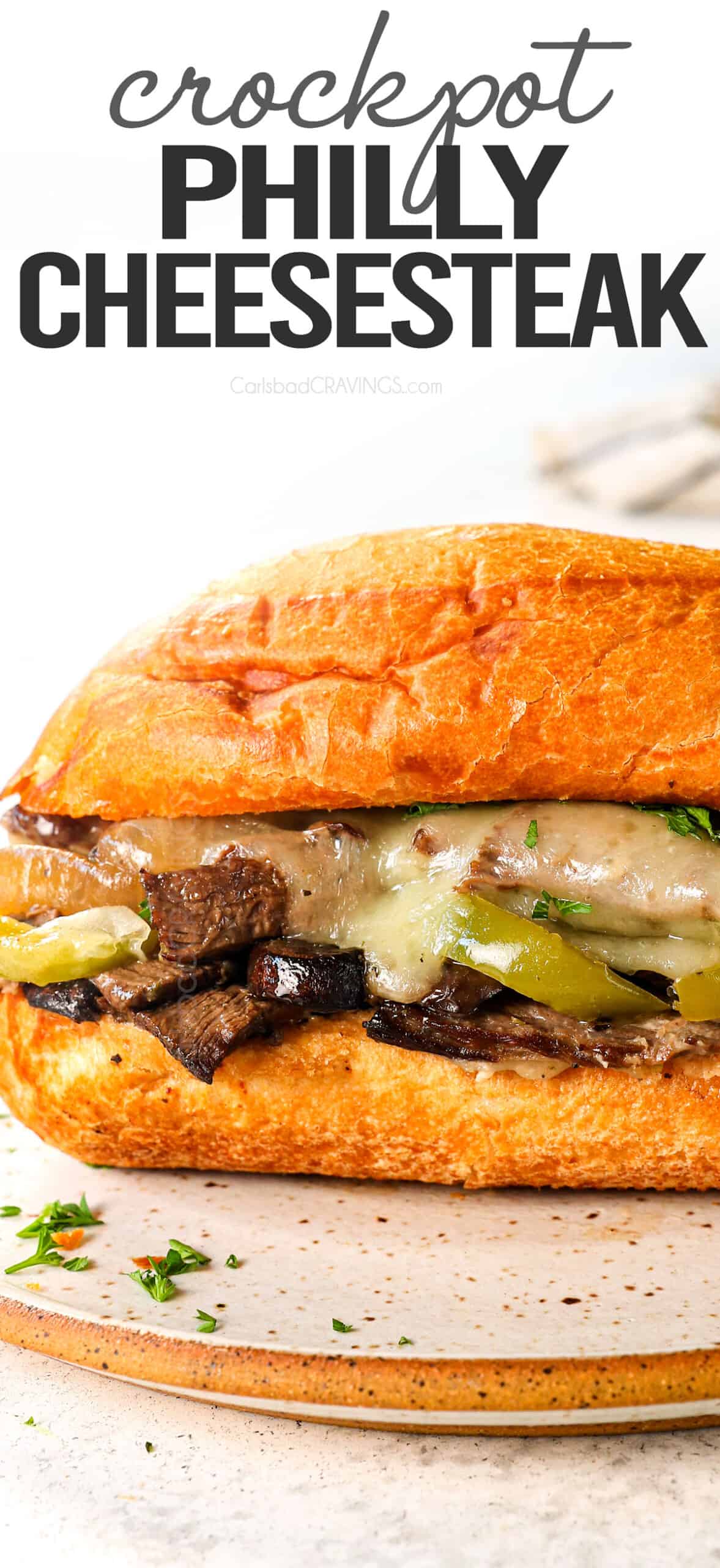 up close of Crockpot Philly Cheesesteak recipe showing how juicy the beef is