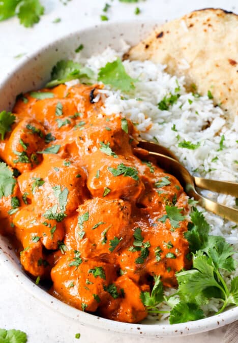 up close or tikka masala with chicken in a bowl with rice