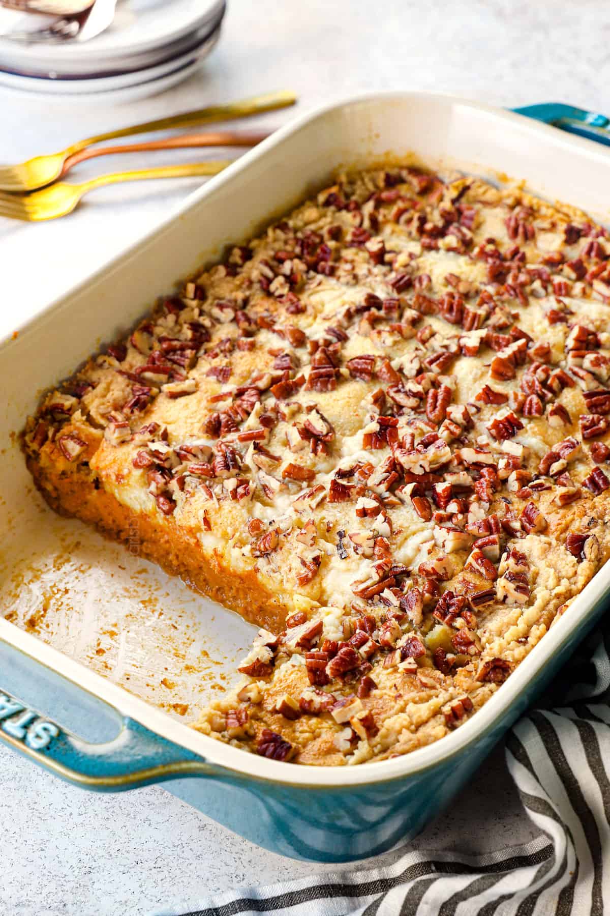 pumpkin dump cake recipe in a 9x13 pan made with pumpkin puree and cake mix