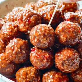 serving meatballs with grape jelly as an appetizer with toothpicks