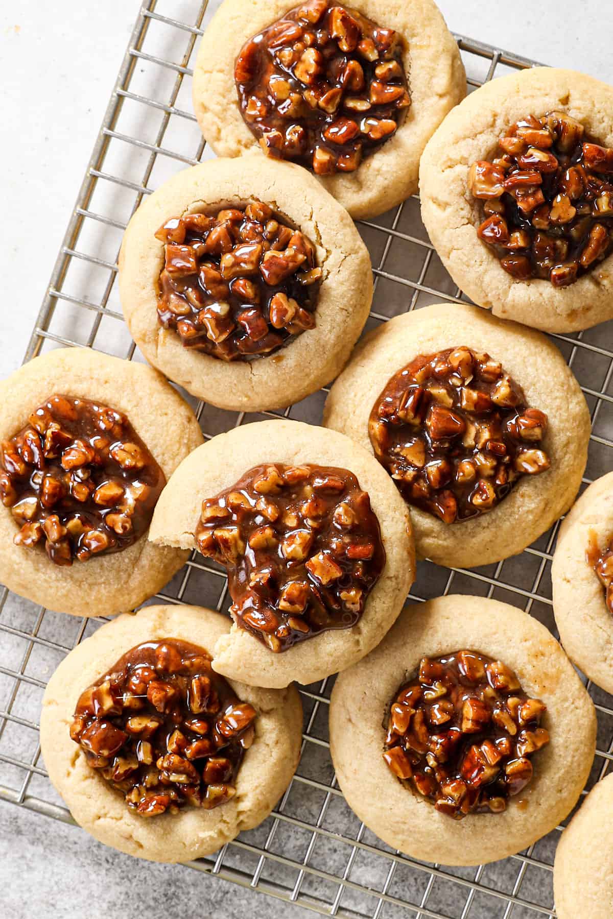 pecan pie thumbprint cookies made filled with pecan pie filling