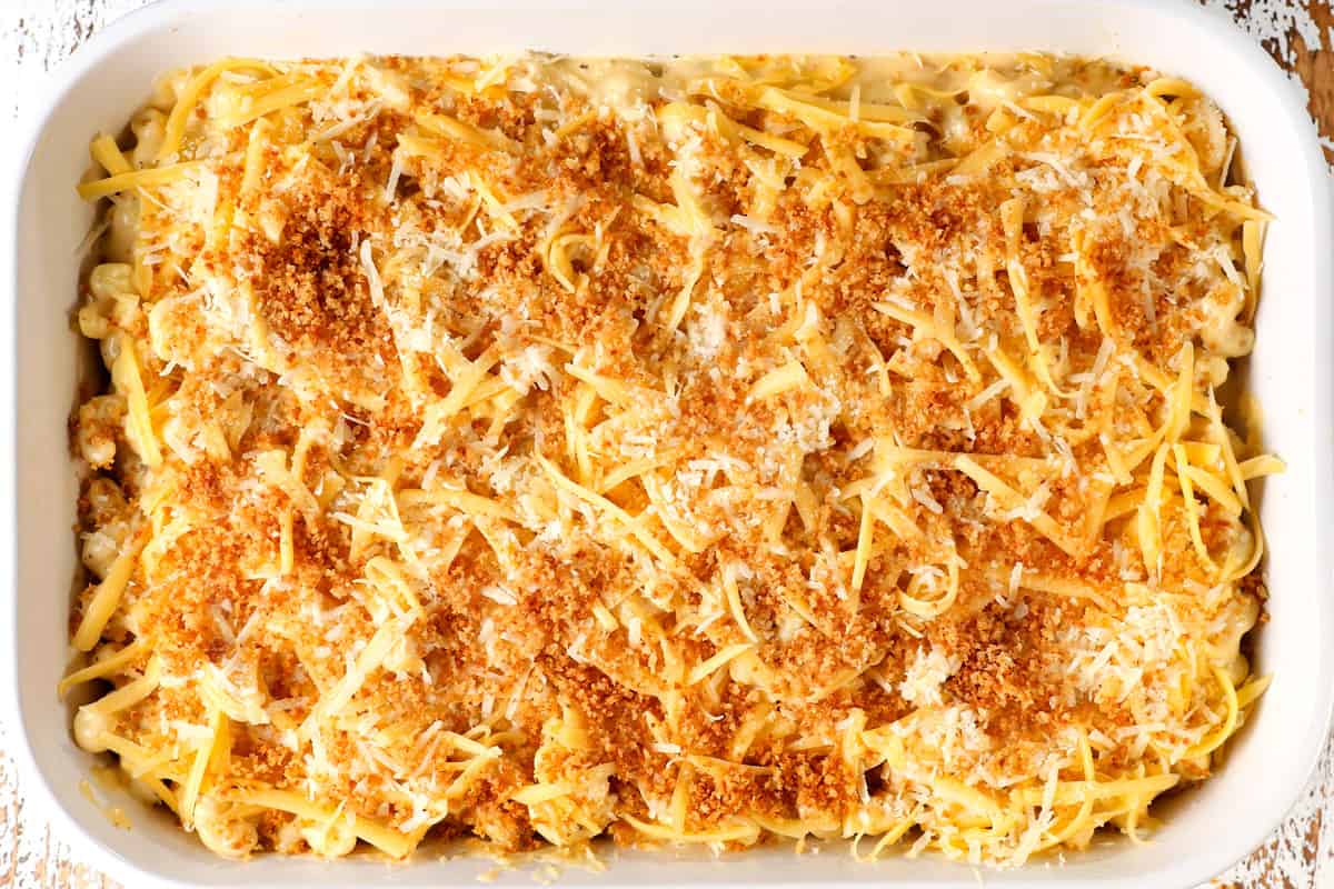 showing how to make best baked macaroni and cheese casserole by topping the pasta with Gouda, Parmesan and panko