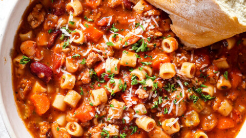 top view of pasta fagioli (pasta fazool) garnished with fresh parsley