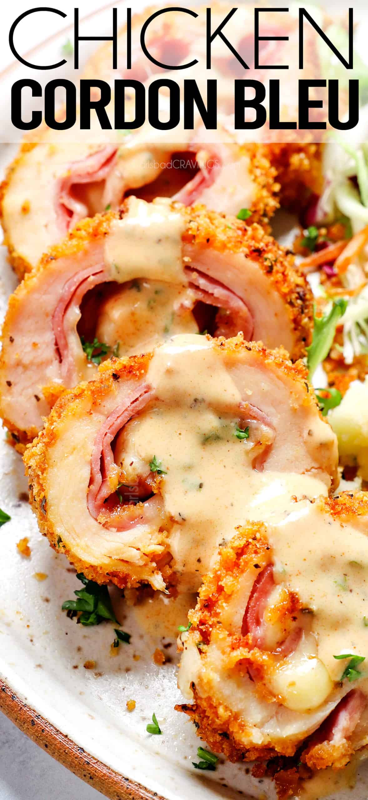 showing how to serve chicken cordon bleu recipe by slicing and serving with Dijon cream sauce
