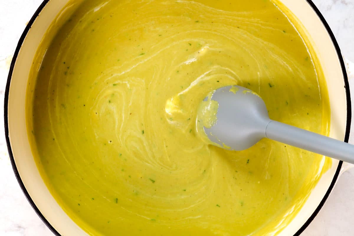 showing how to make creamy Asparagus Soup recipe by adding Greek yogurt