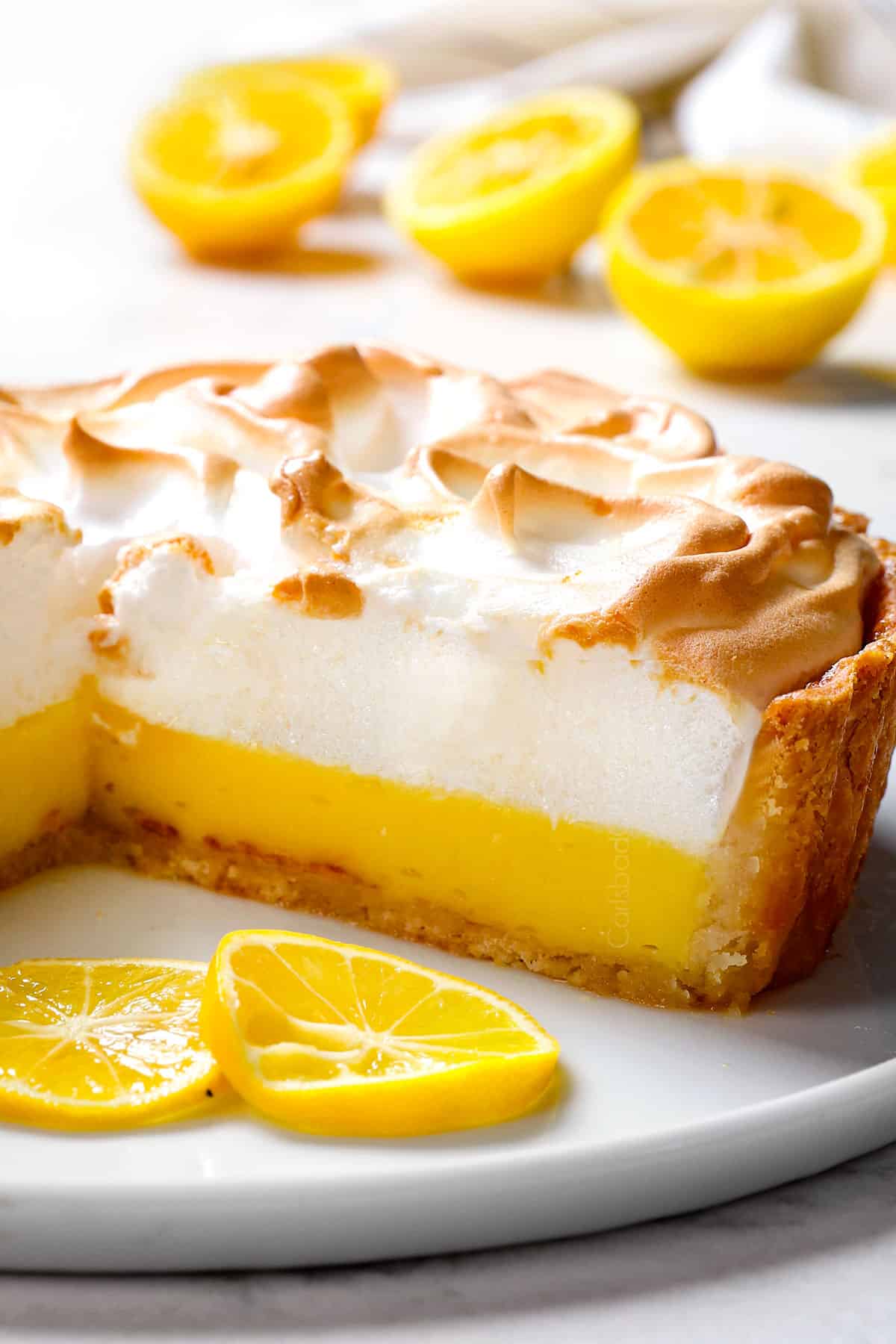 up close of best Lemon Meringue Pie recipe showing the creamy lemon filling and fluffy meringue 