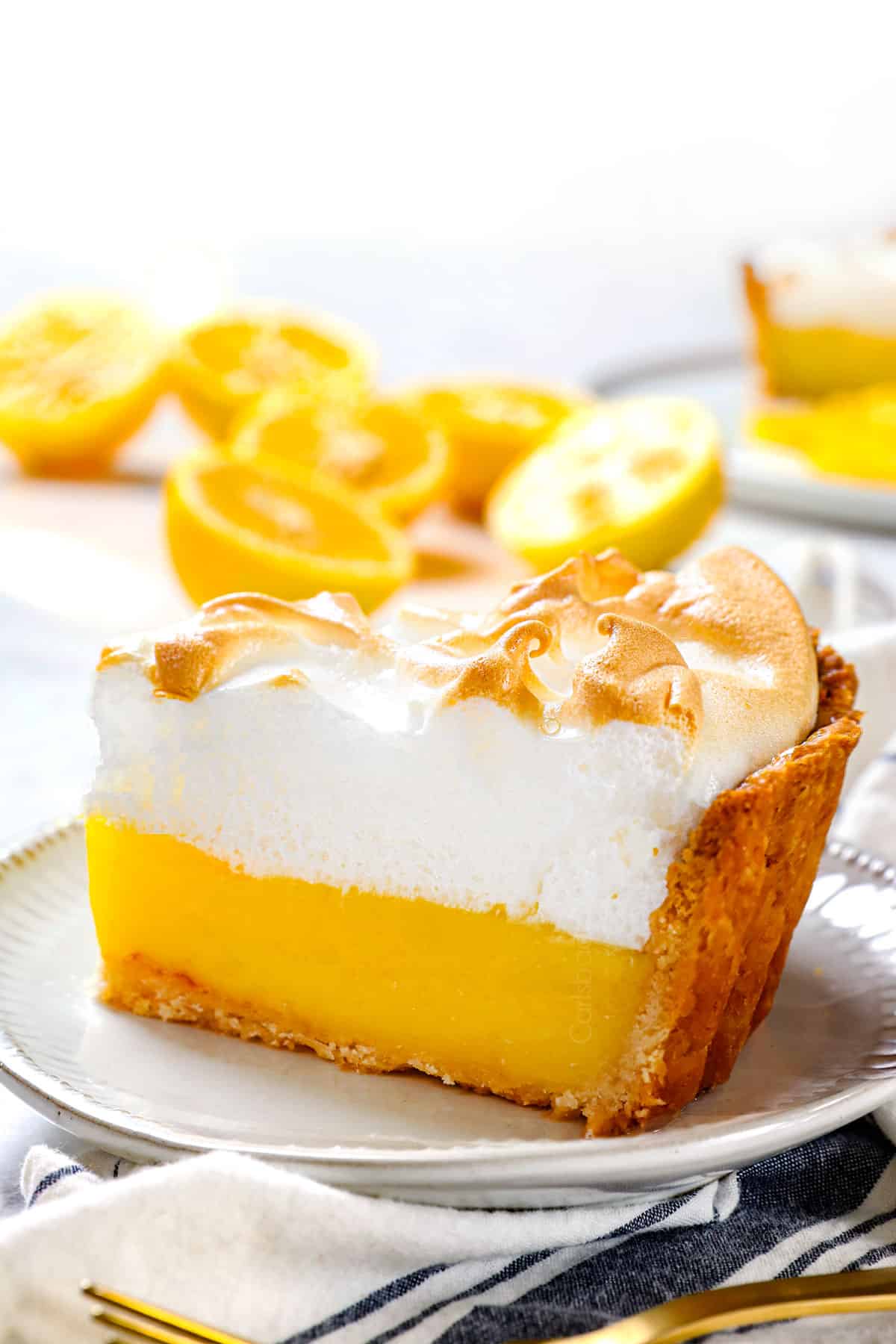 a slice of foolproof Lemon Meringue Pie on a plate 
