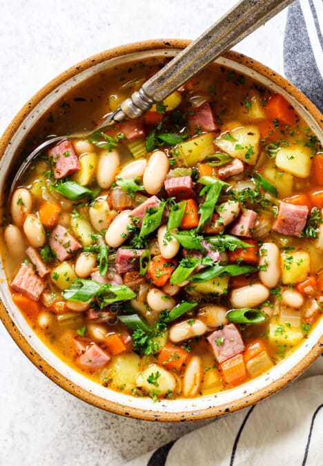 ham and bean soup recipe with potatoes and white beans served in a bowl