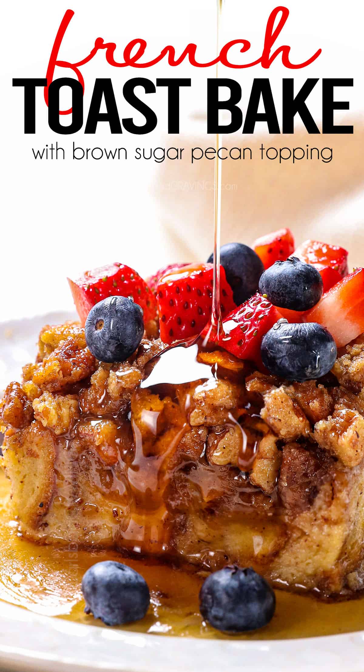 up close of serving French Toast Casserole (French Toast Bake) by pouring syrup over a slice