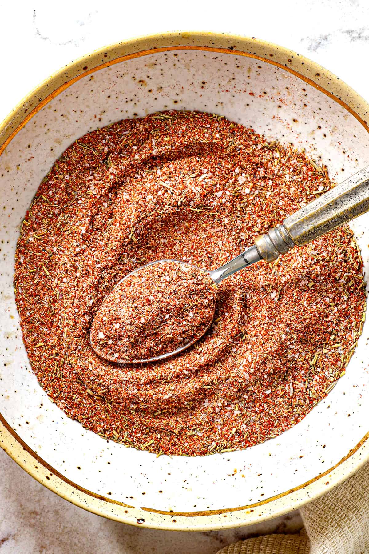 top view of mixing steak seasoning recipe together in a bowl