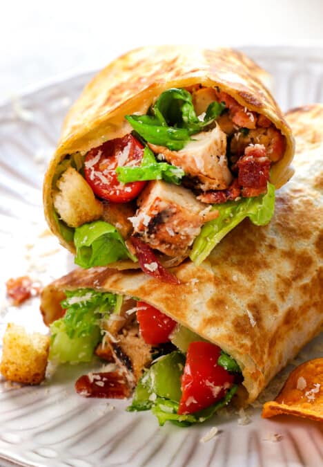 up close of Chicken Caesar Wrap showing the juicy chicken and crunchy lettuce