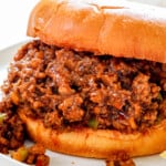 up close of Sloppy Joe recipe showing how juicy the meat is on a bun