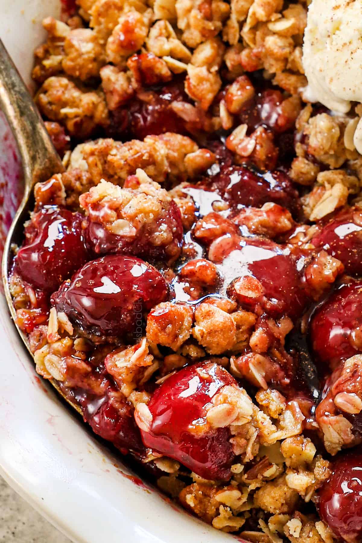 showing how to serve cherry crisp recipe with crispy oat topping
