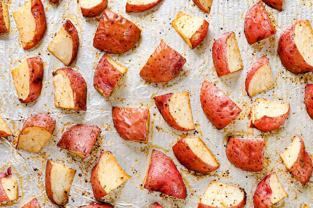 showing how to make red potato salad by roasting red potatoes until tender in the oven