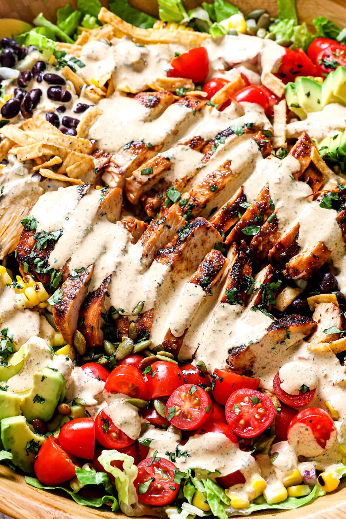up close of Southwest Chicken Salad drizzled with dressing