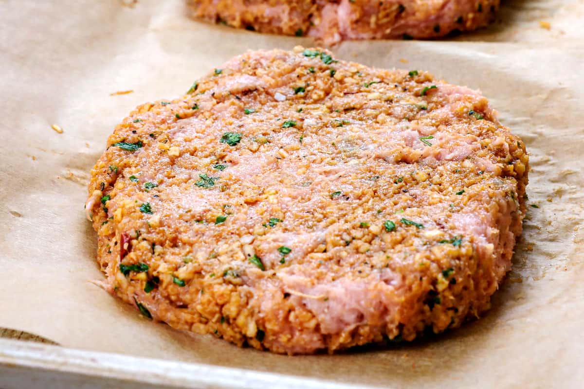 showing how to make turkey burgers by forming turkey mixture into patties 
