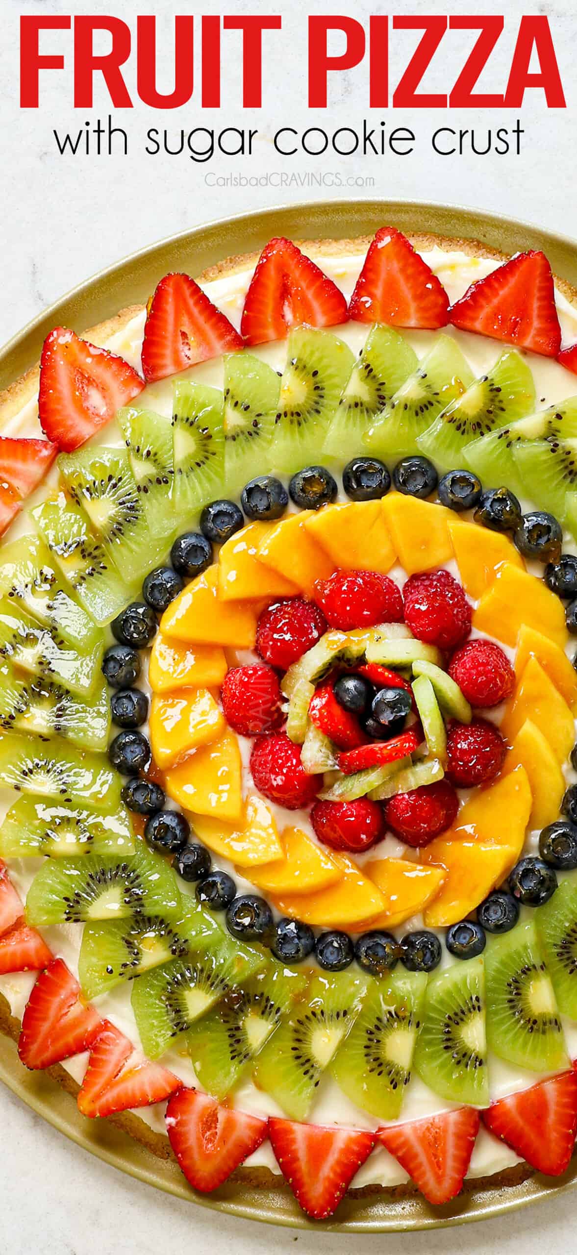 top view of fruit pizza with sugar cookie crust on a platter