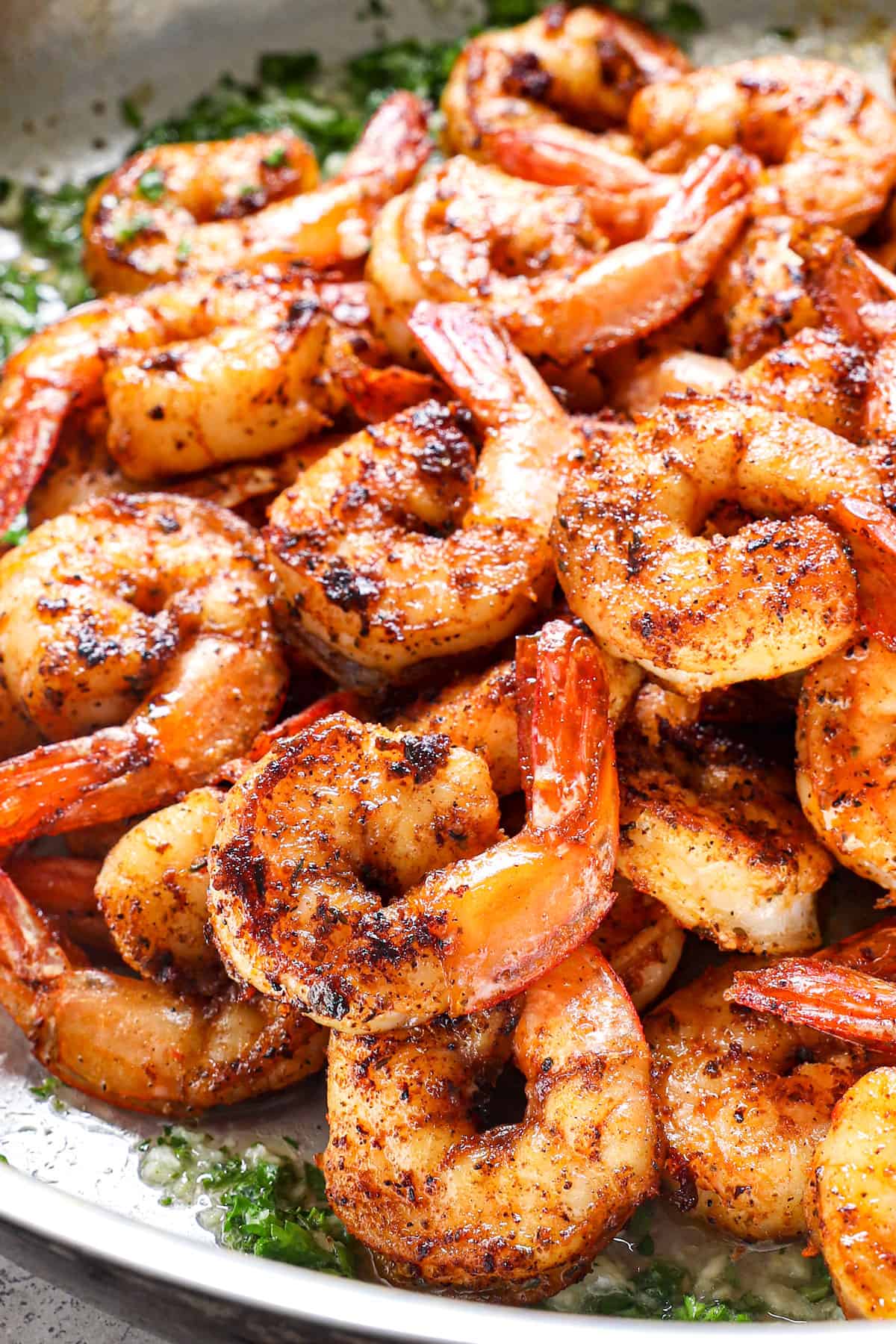 up close of Cajun shrimp showing how juicy it is