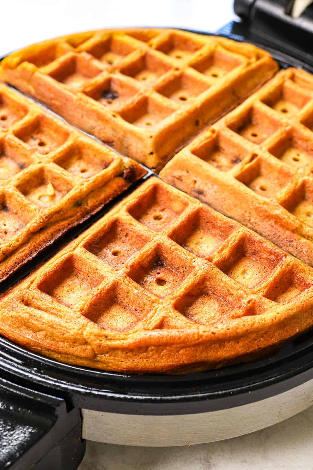 showing how to make pumpkin waffles extra crispy by cooking in the waffle iron longer