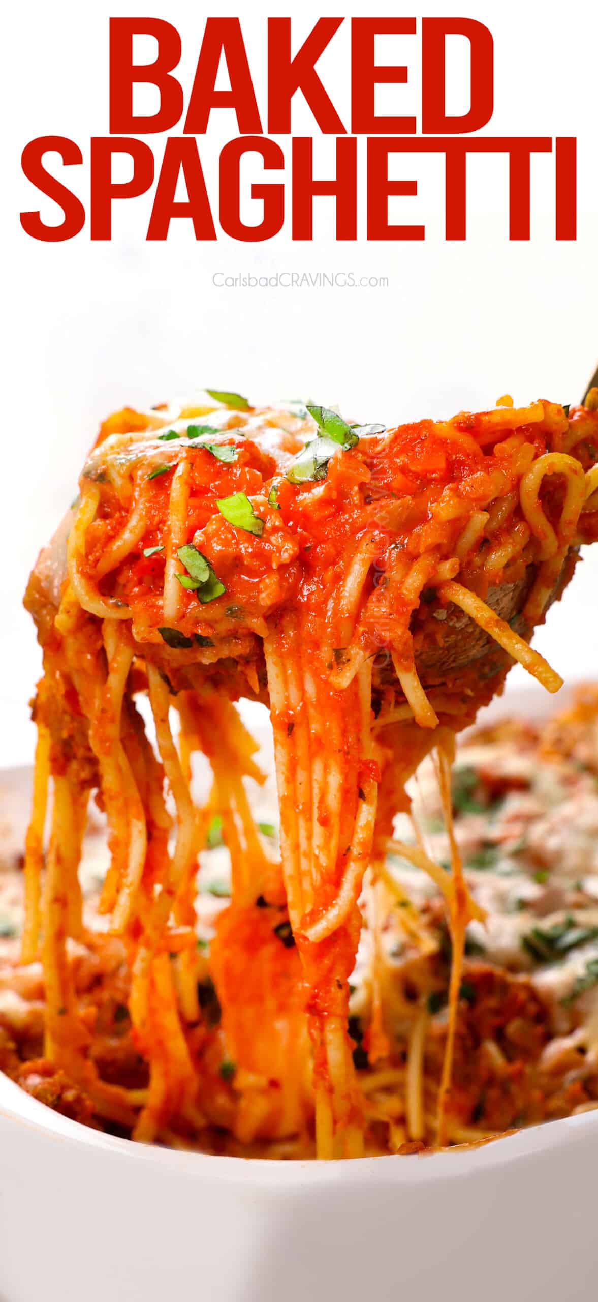 A spoonful of serving Baked Spaghetti showing how cheesy it is 