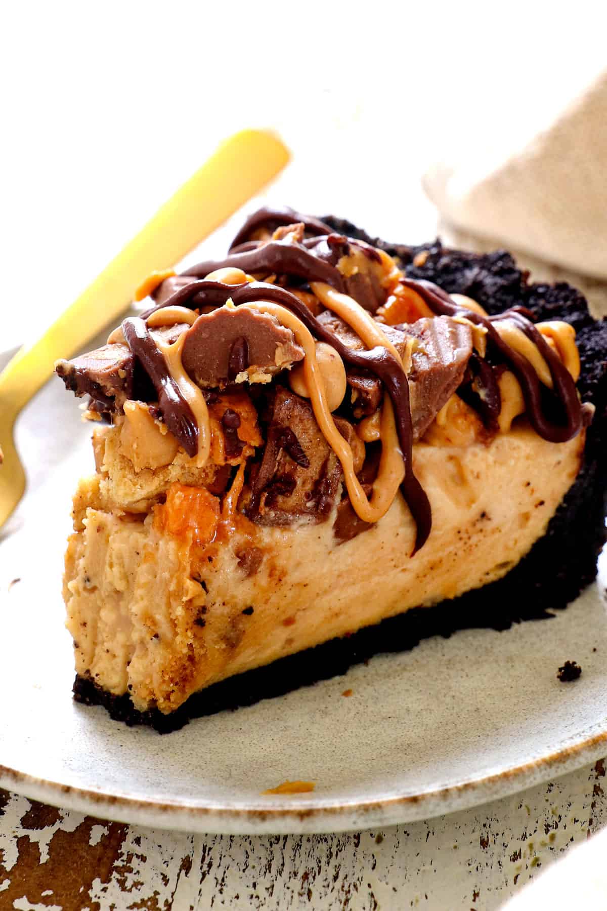 up close of a piece of no bake peanut butter pie with a bite take out of it