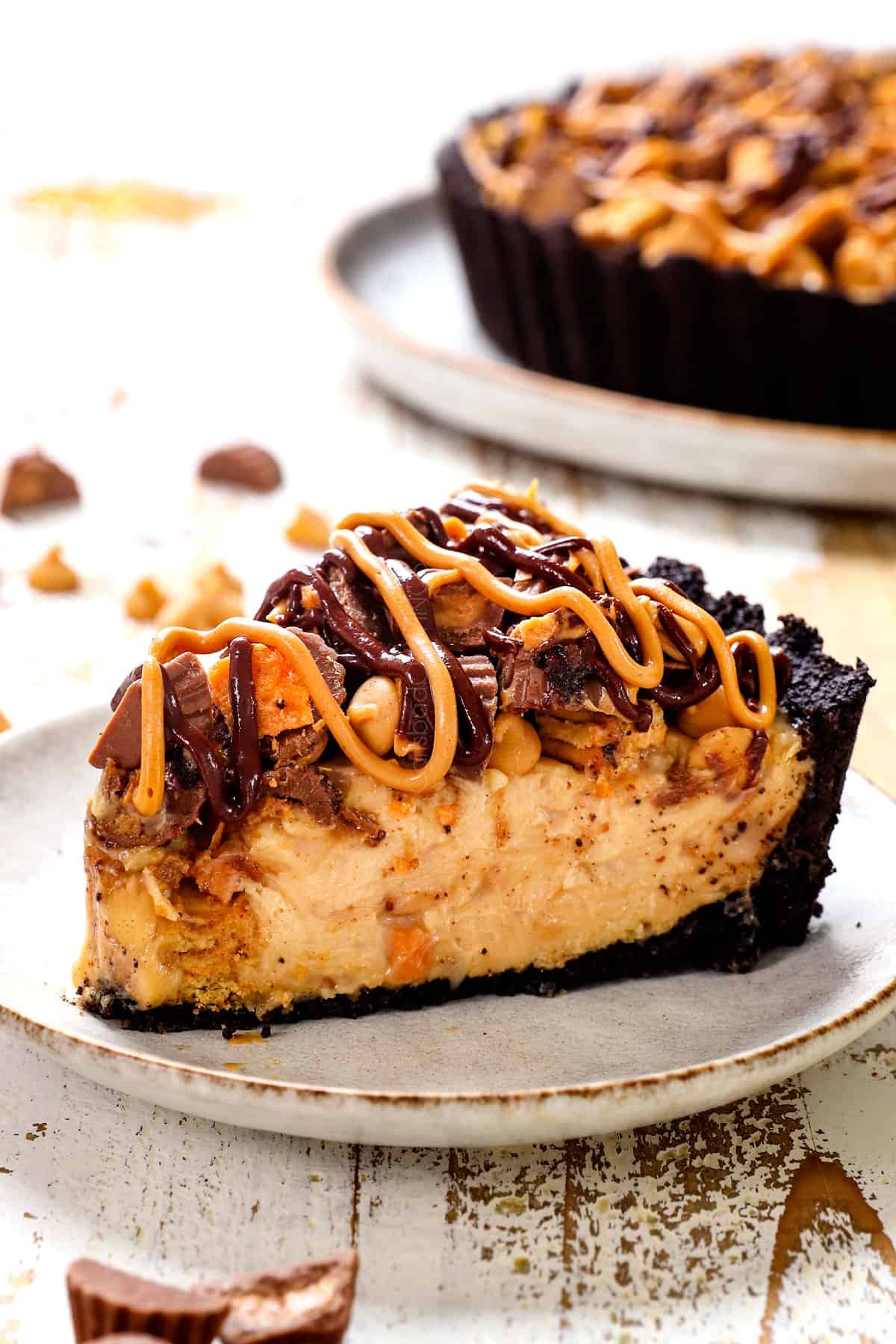 a slice of chocolate peanut butter pie showing how creamy it is