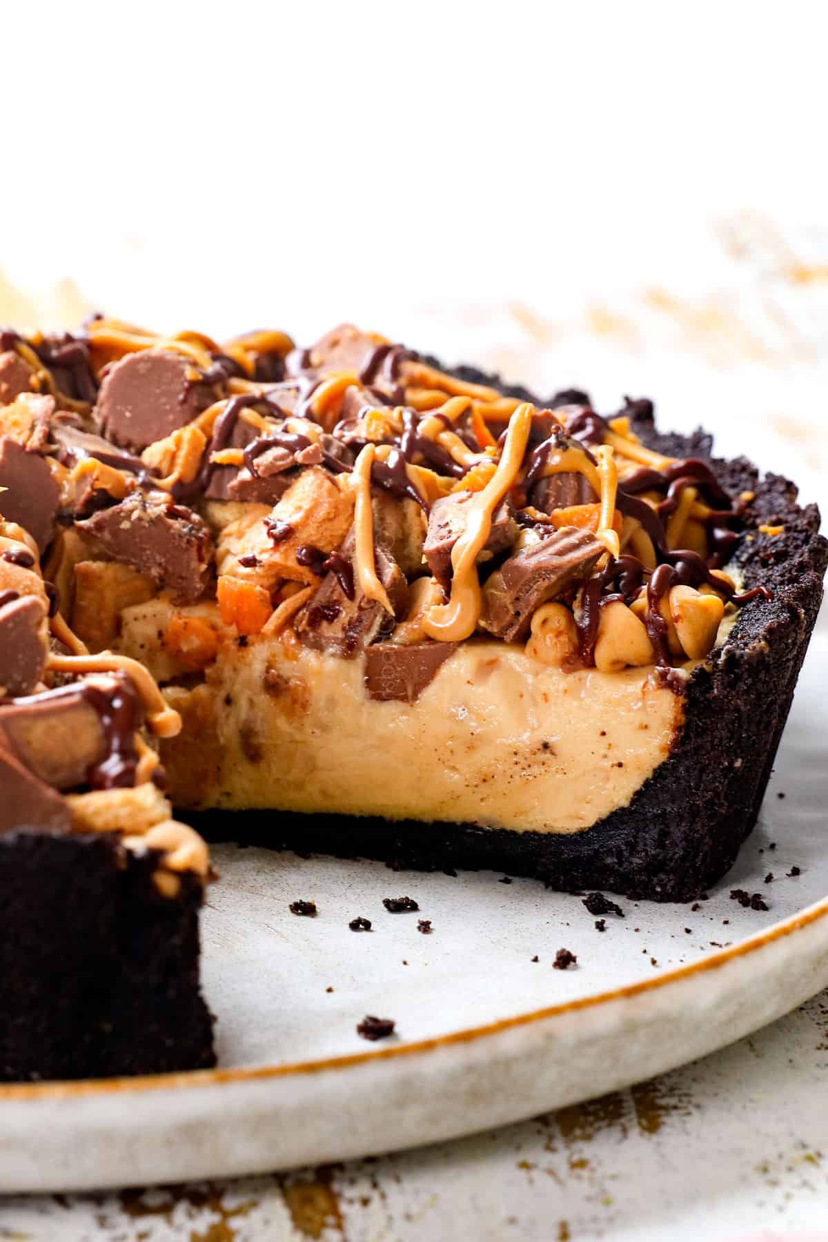 easy peanut butter pie with a slice missing showing how creamy the peanut butter filling is