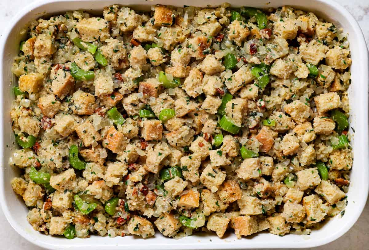 showing how to make stuffing by adding to a 9x13 baking dish to bake