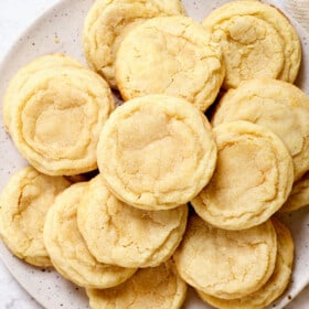 top view of sugar cookies on a plate showing the craggy tops