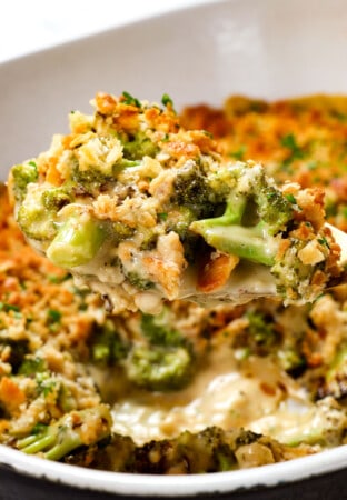 scooping up broccoli casserole recipe with a spoon