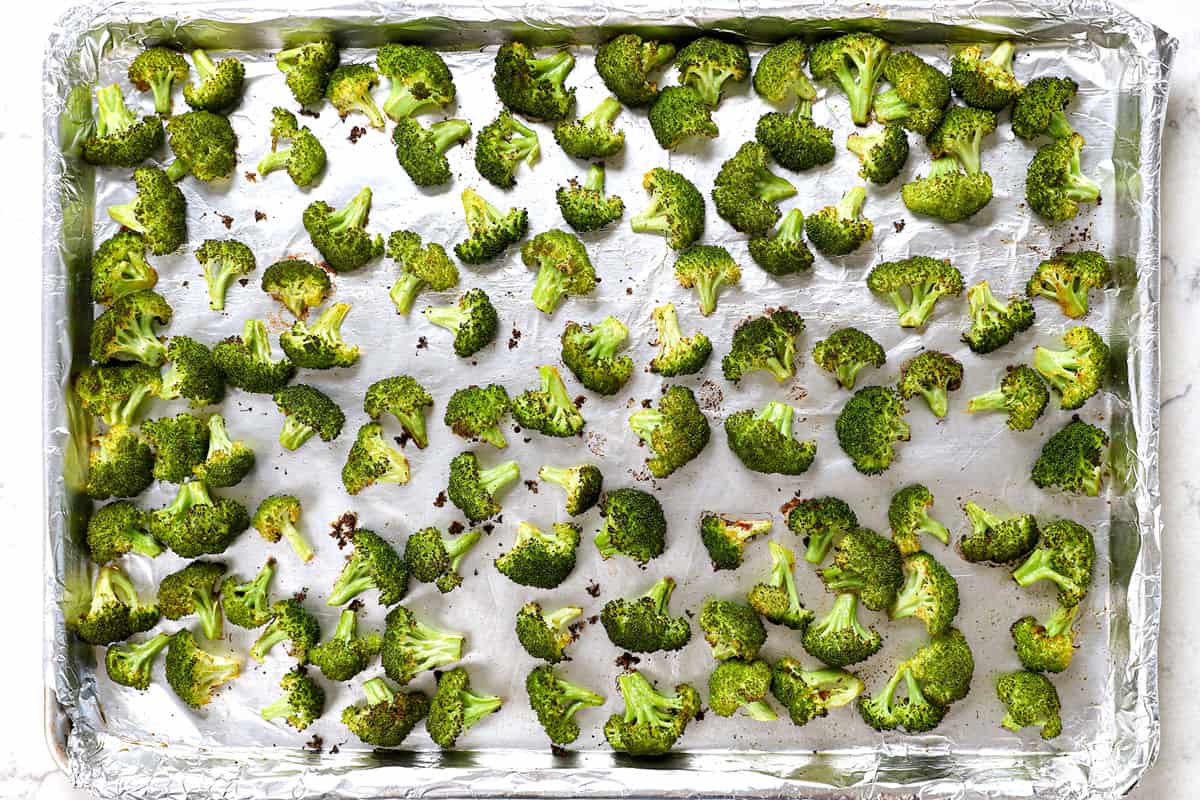 showing how to make broccoli casserole by roasting broccoli in a sheet pan