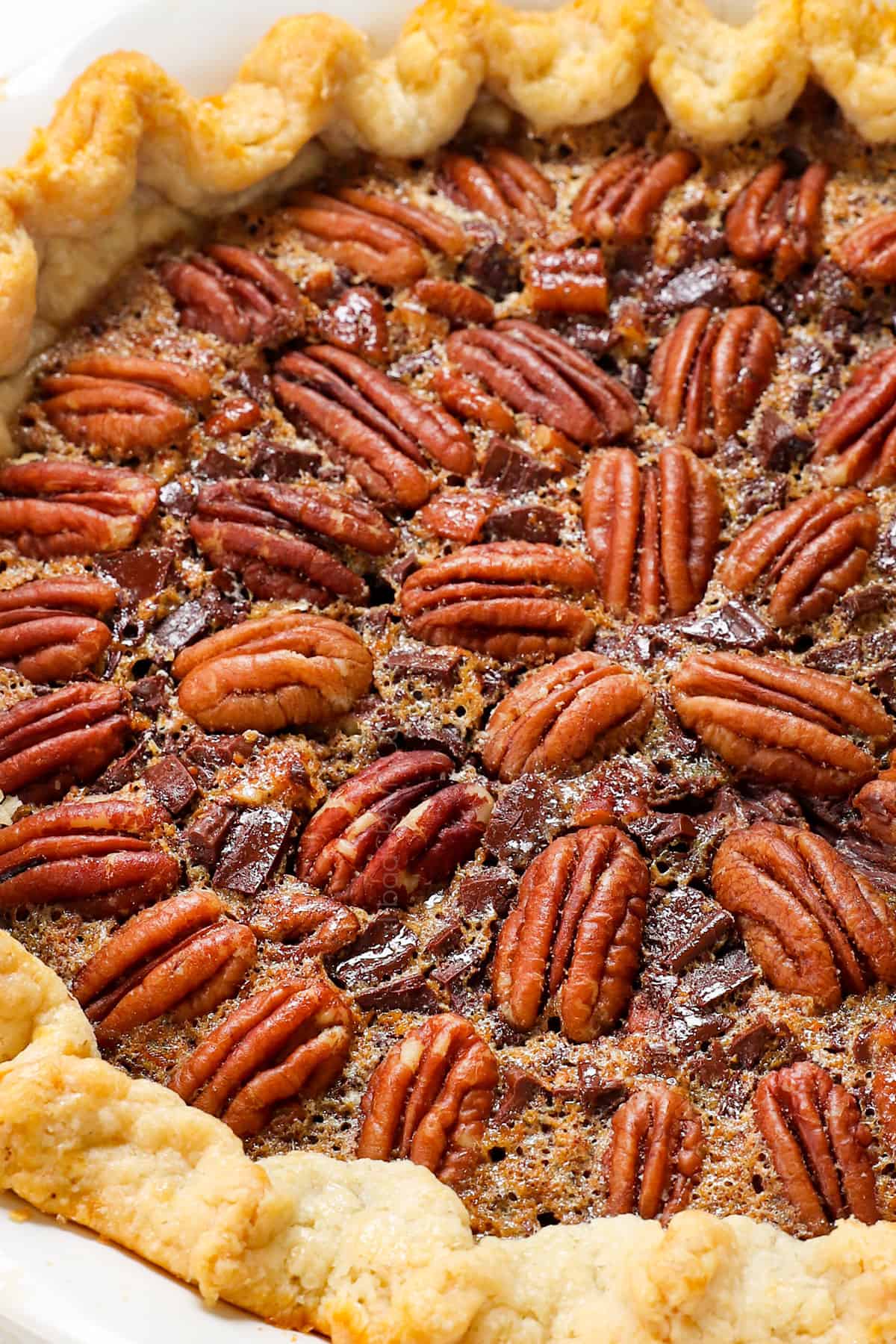 showing how to make chocolate pecan pie by baking until the filling is set and reaches 200 degrees F