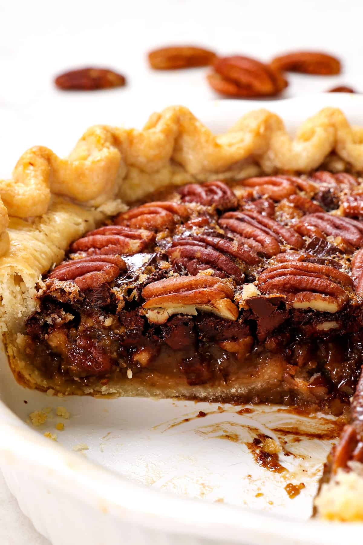 up closer of chocolate pecan pie showing what set filling looks like