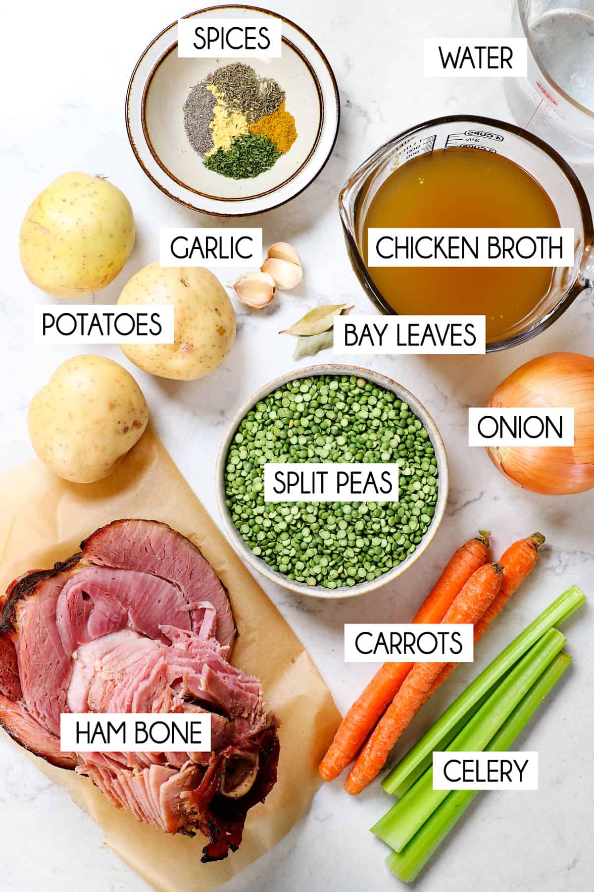 showing the split pea soup ingredients:  split peas, ham bone, carrots, celery, potatoes, onion, garlic, chicken broth, water and spices