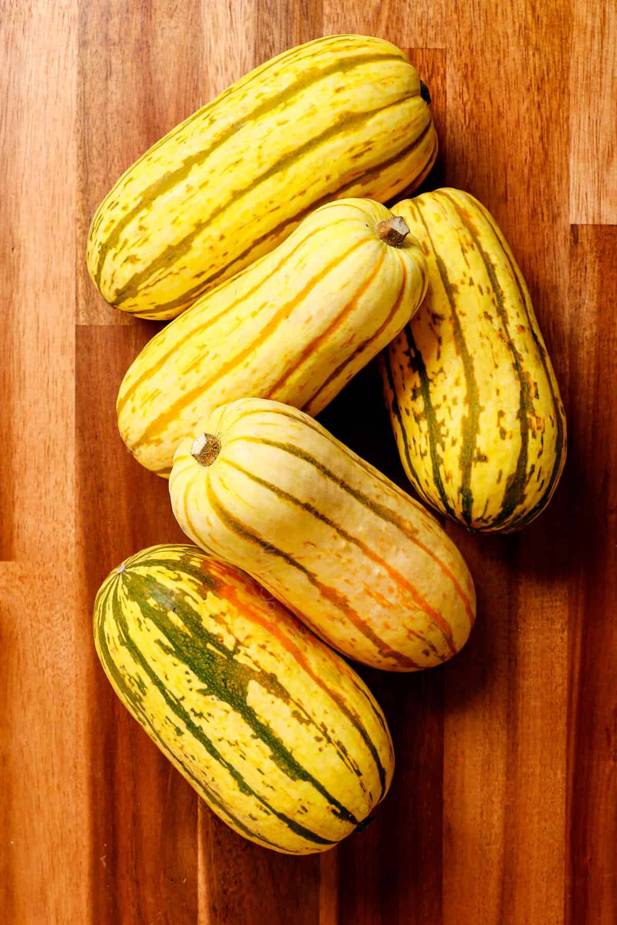 top view of 5 delicata squash showing what delicata squash look like