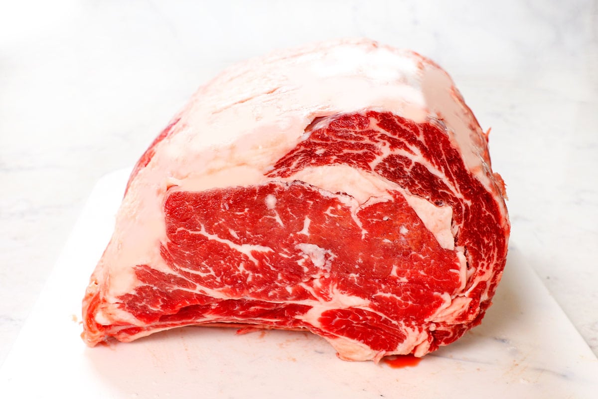 showing how to select a prime rib with rich marbling and bright color